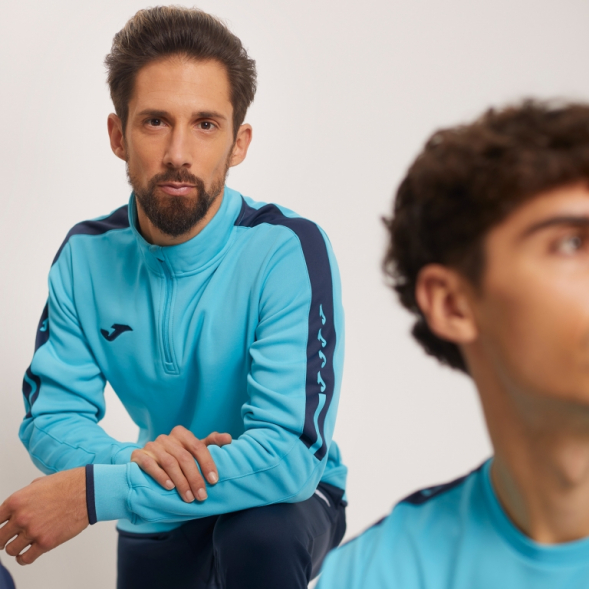 SUDADERA OLIMPIADA TURQUESA FLÚOR NEGRO